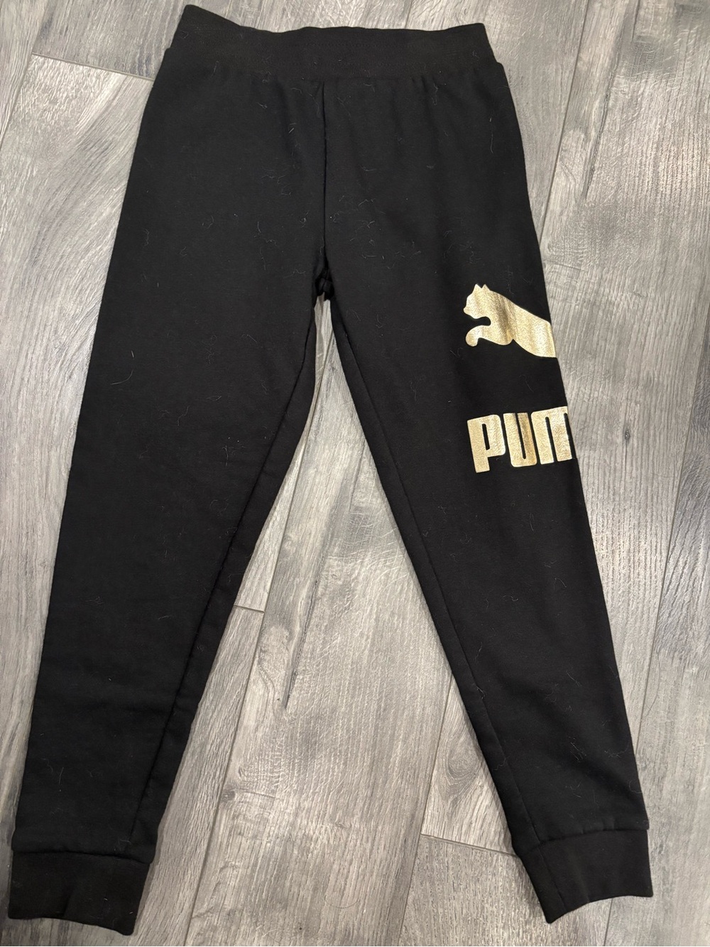 Puma Black Jogger Sweatpants with Gold Logo